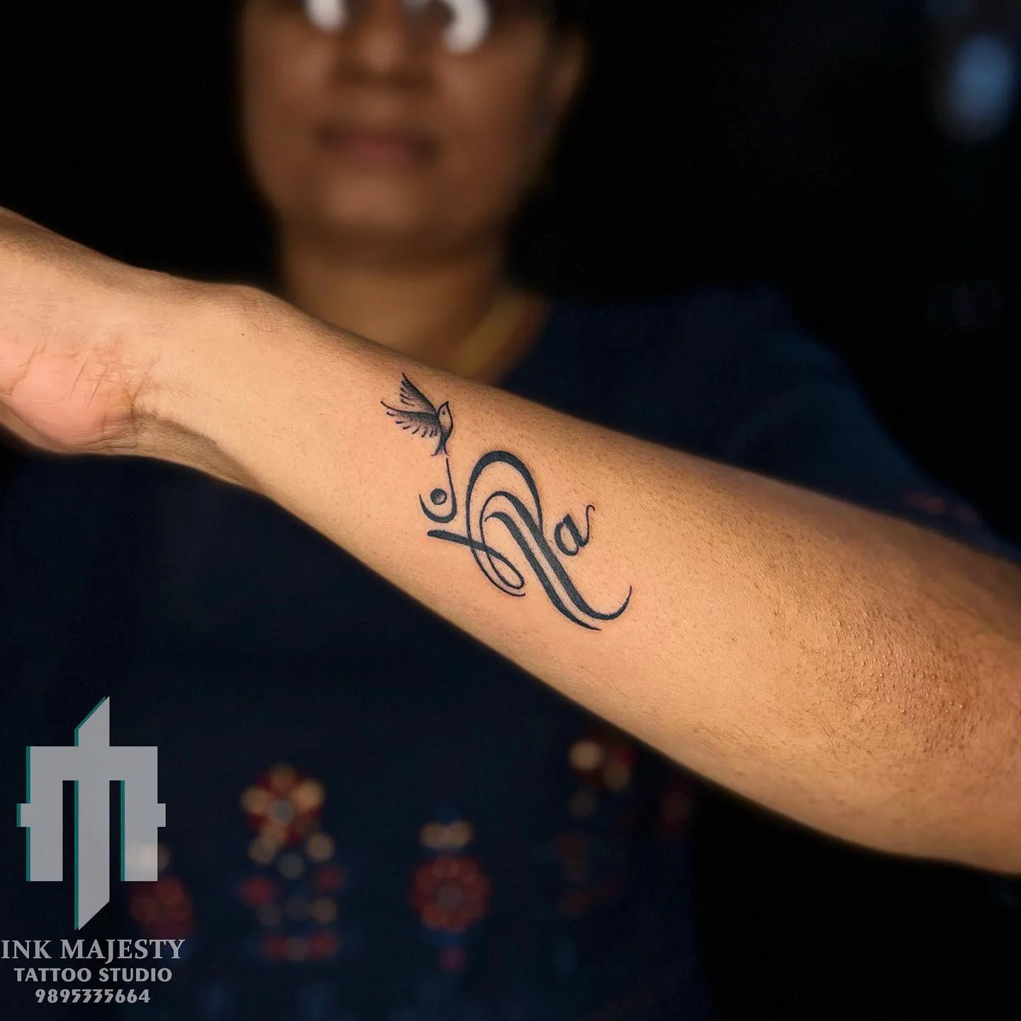 Artistic Ganesha motif on side of hand tattoo