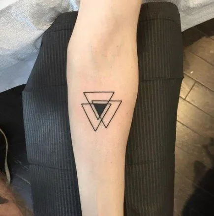 Bold Lines of a Geometric Tetrahedron Tattoo
