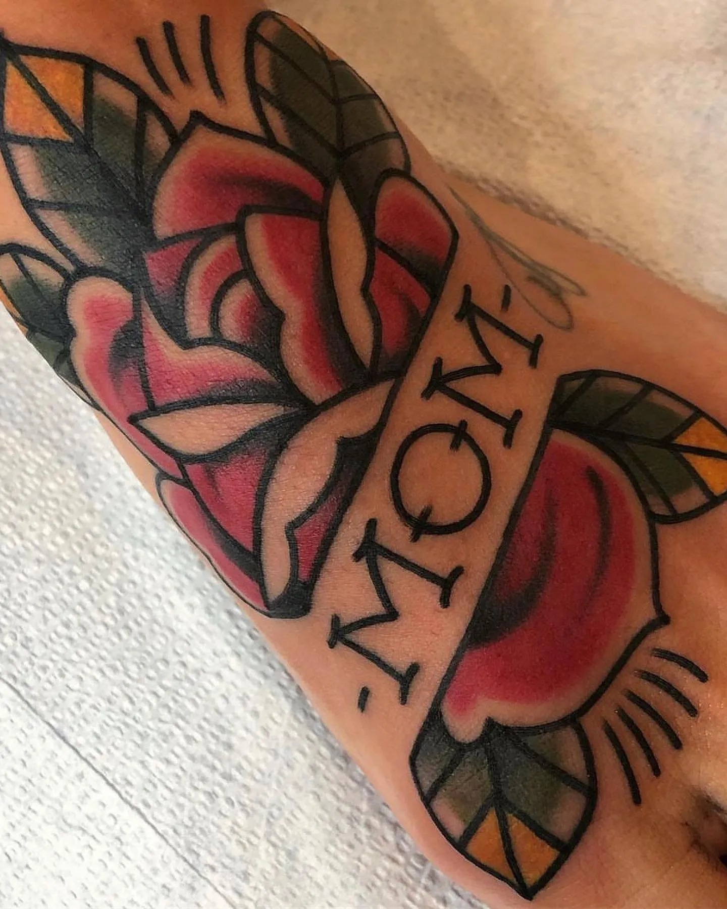 Bold Traditional Mom Tattoo with Flourishing Flowers