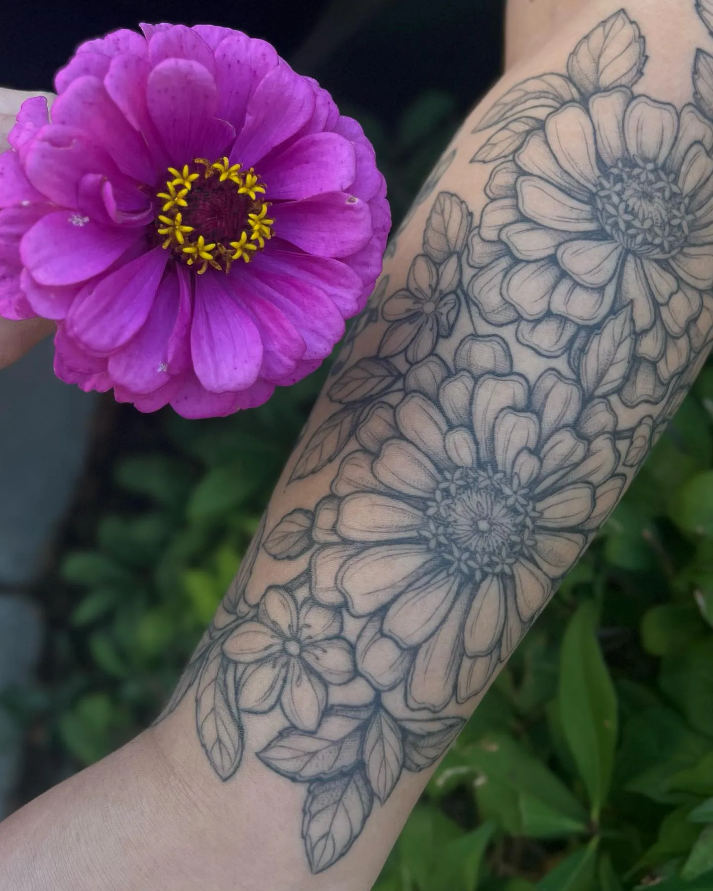Botanical Zinnia Sleeve Tattoo with Leaves