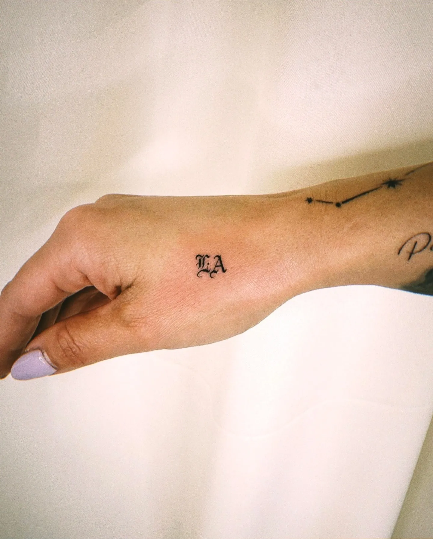 Chic LA Initials Side Hand Tattoo