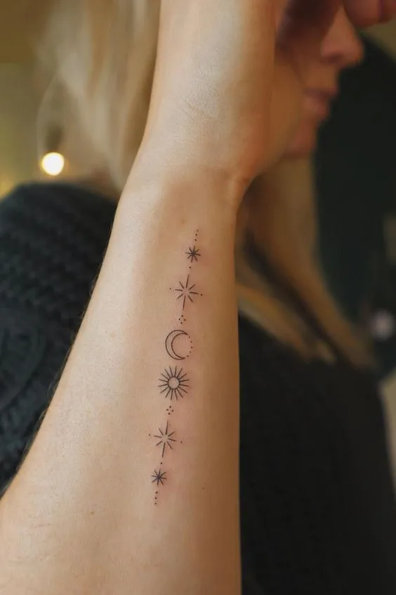 Delicate Celestial Symbols Inked on the Side
