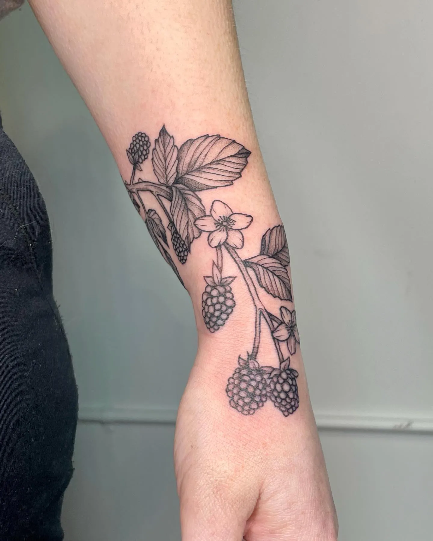 Delicate Wrist Tattoo Featuring Blackberry Vine