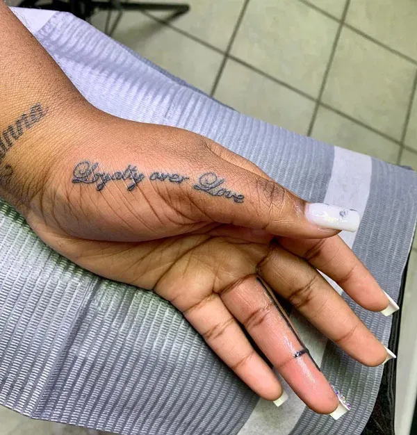 Elegance and Promise on a Delicate Hand Tattoo