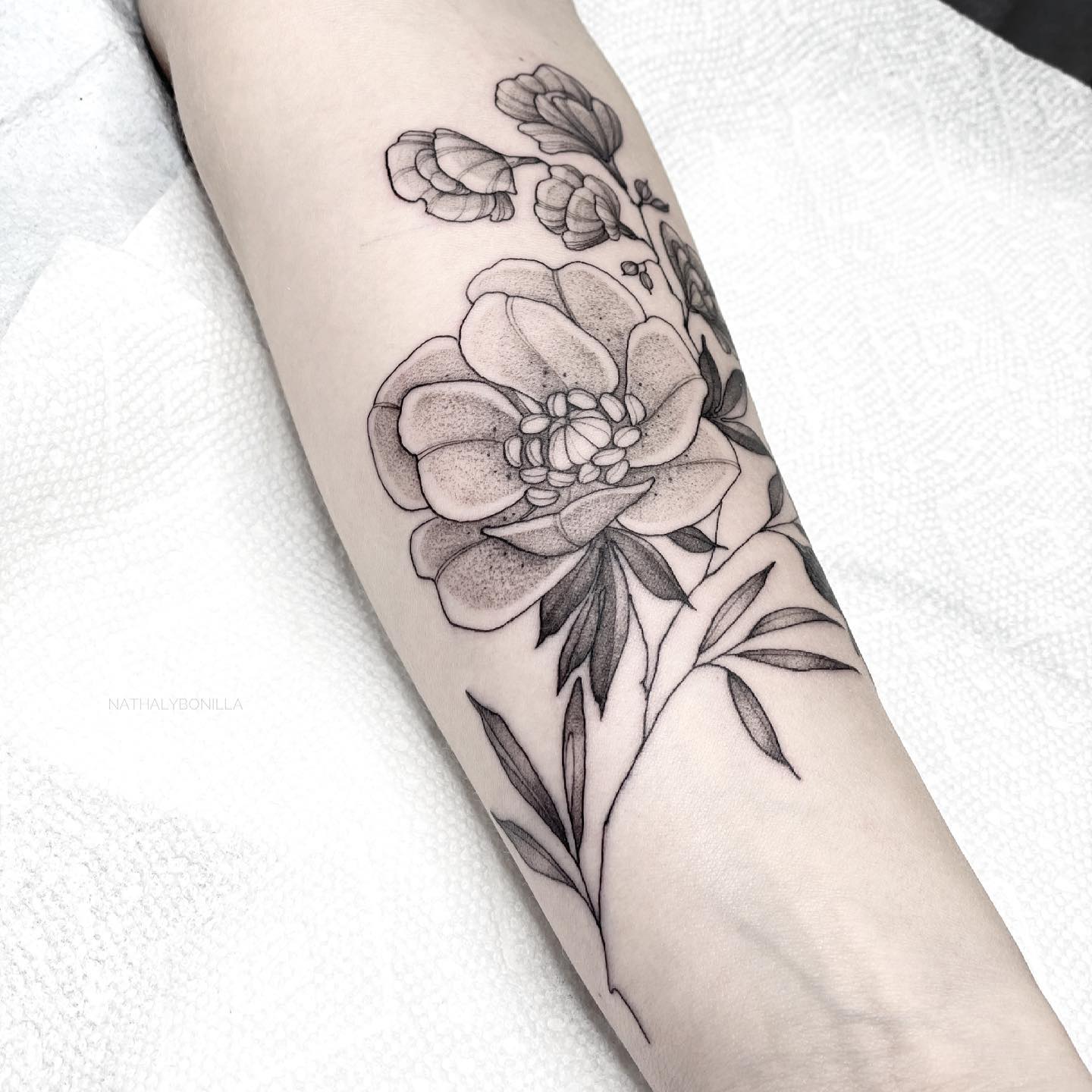 Elegant Black and White Floral Tattoo
