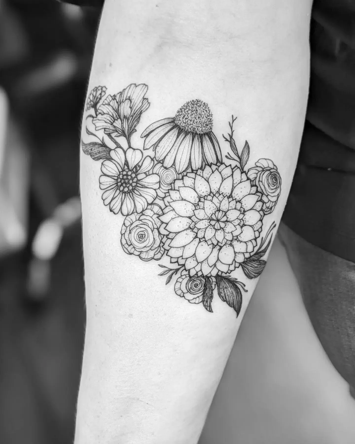 Elegant Black and White Zinnia Tattoo Design