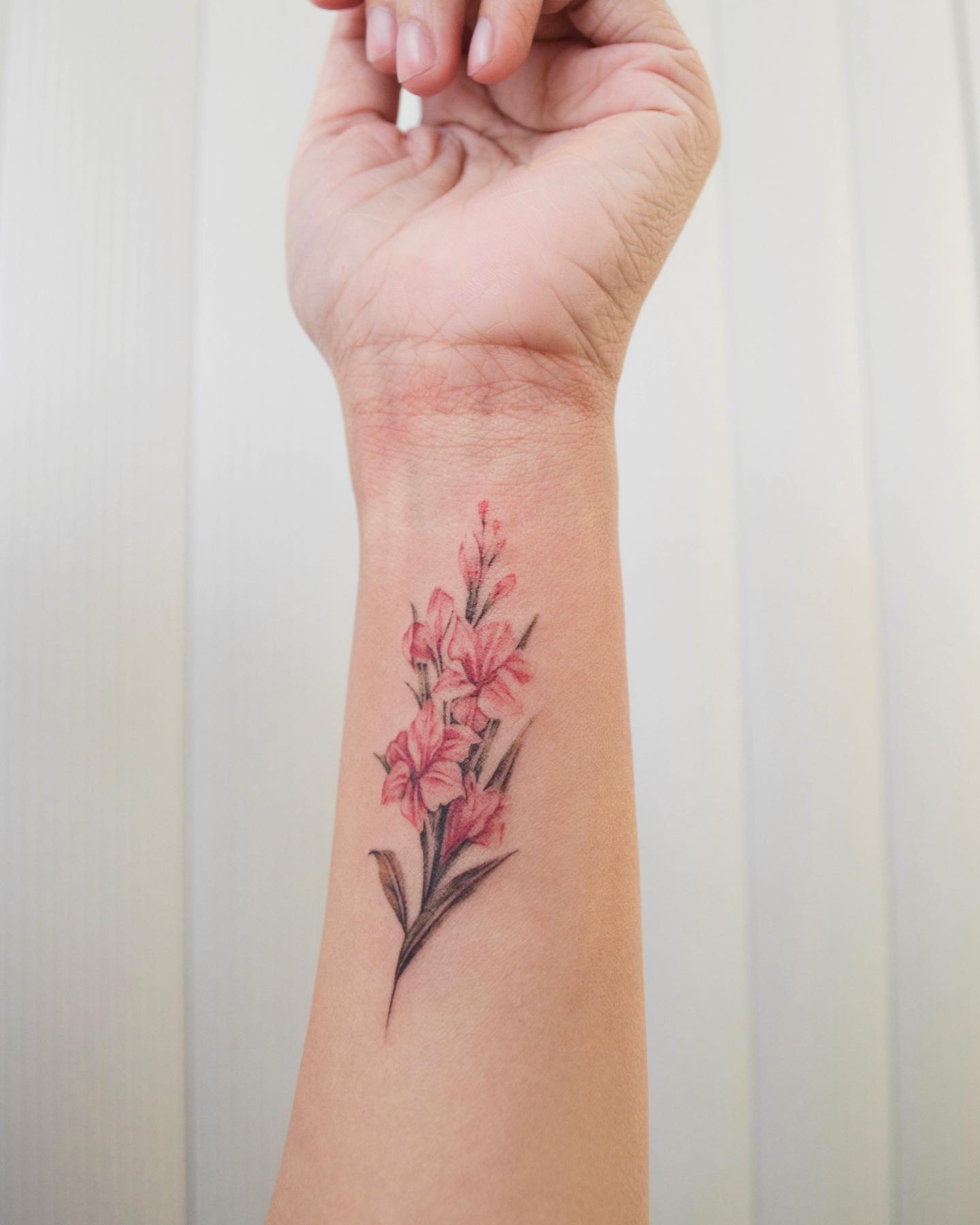 Elegant Floral Tattoo on Wrist