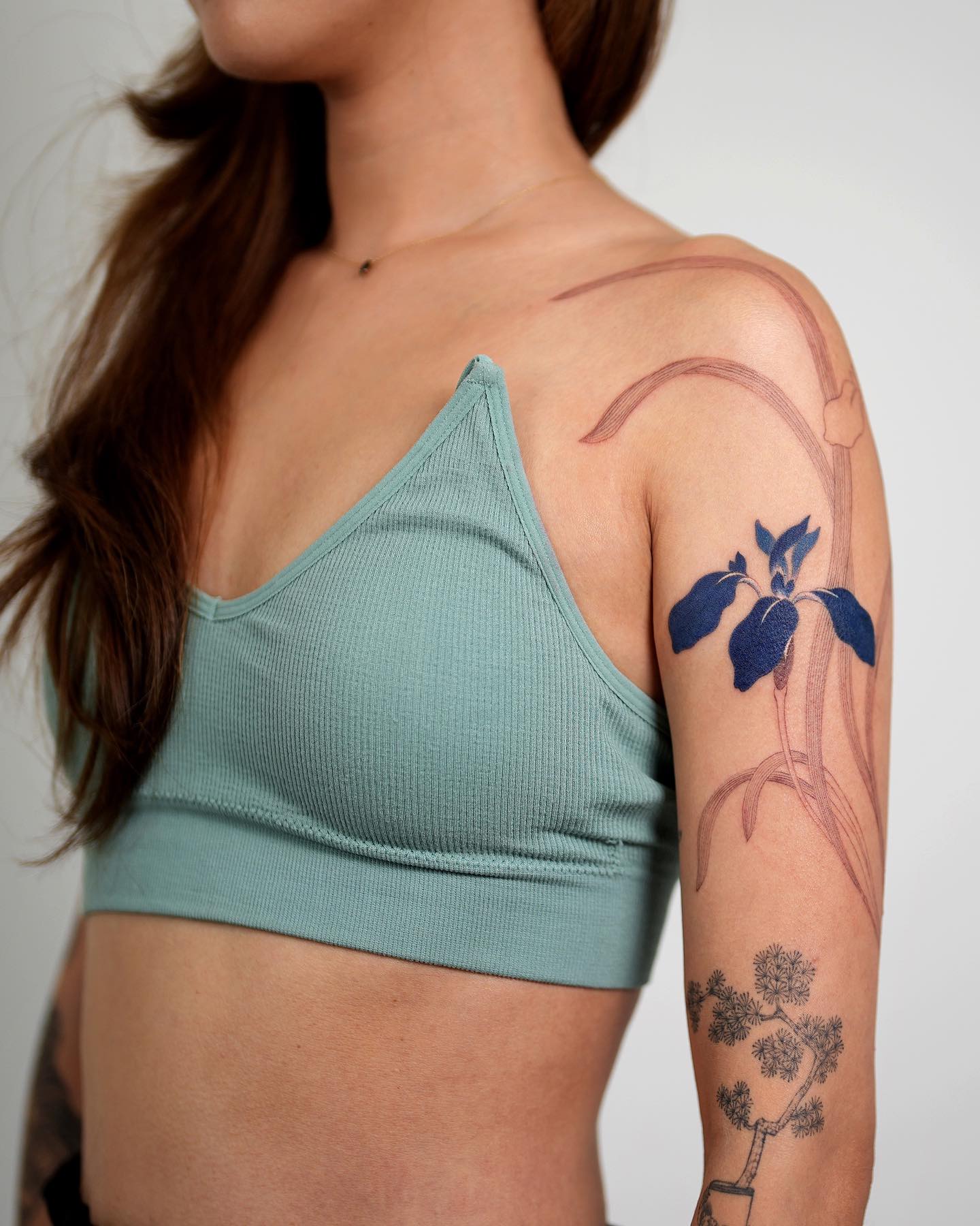 Elegant Floral Tattoo with Deep Blue Iris Flowers