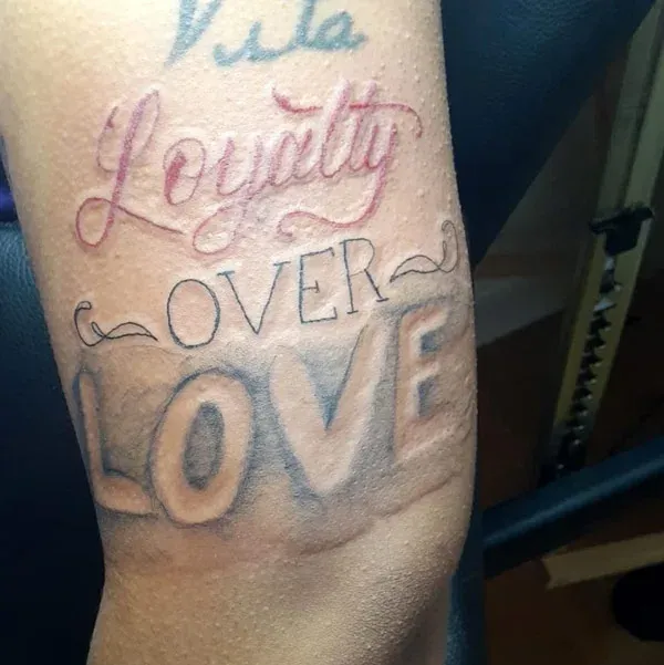 Forearm Tattoo Merging Strength and Sentiments