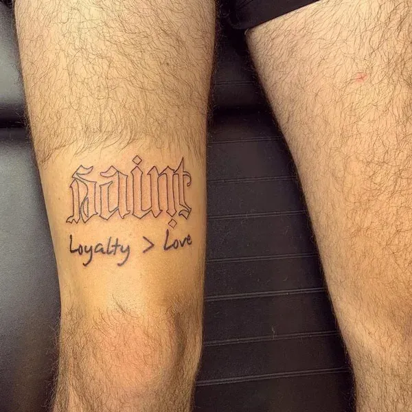 Gothic Font Loyalty Knee Tattoo