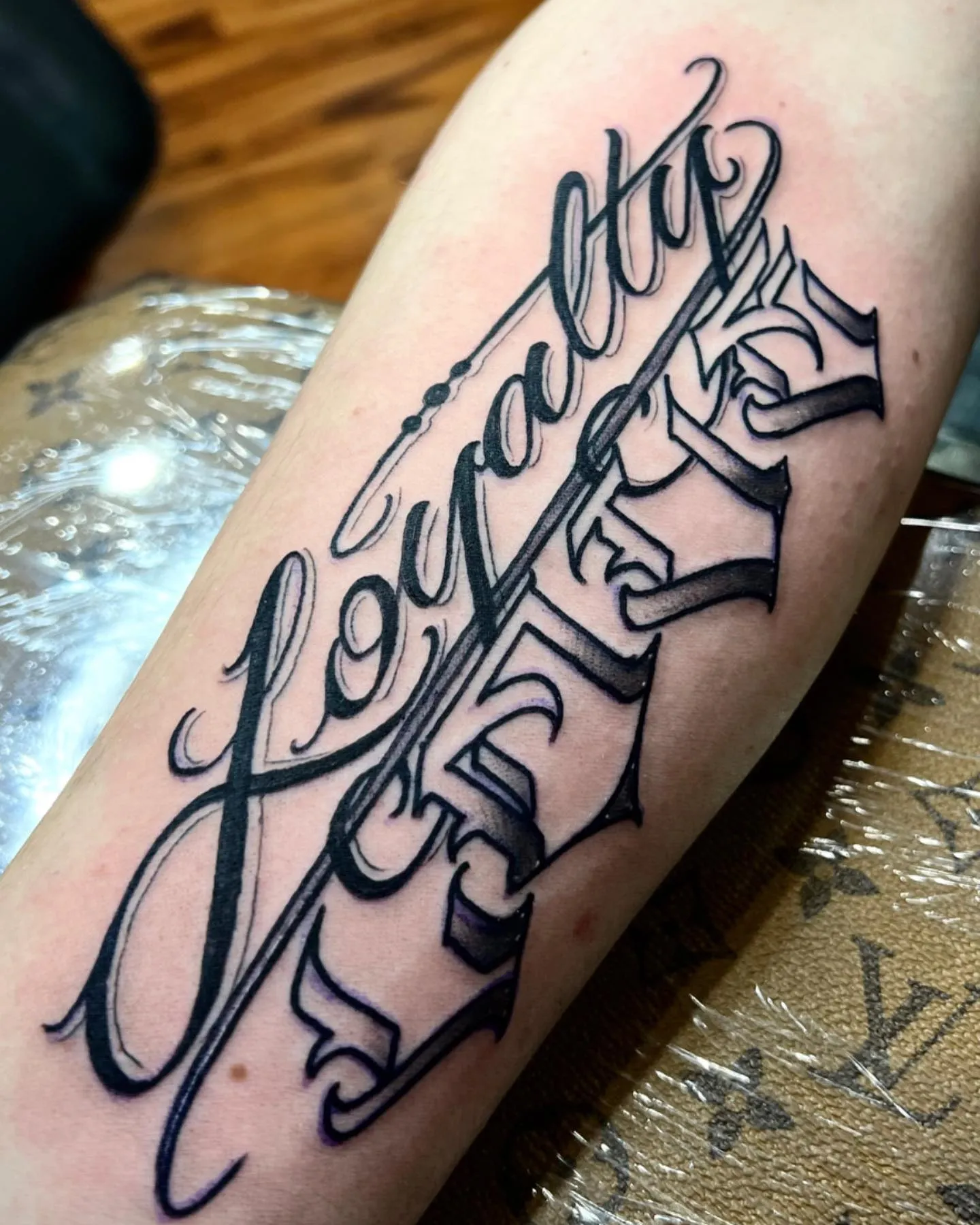 Gothic Style Loyalty Over Love Statement Tattoo