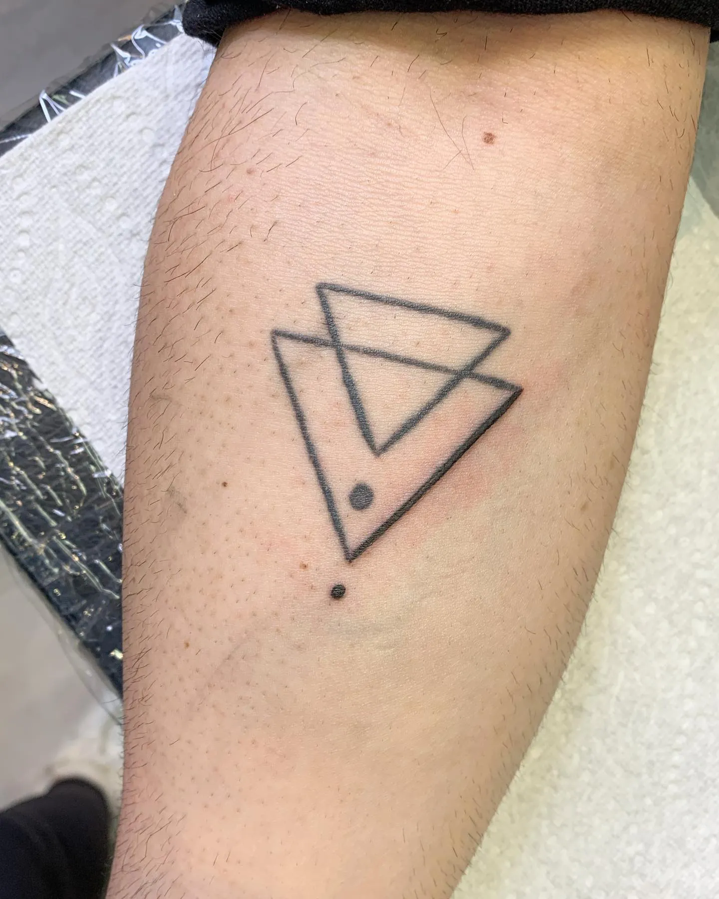 Harmony in Disparity with Double Triangle Tattoo