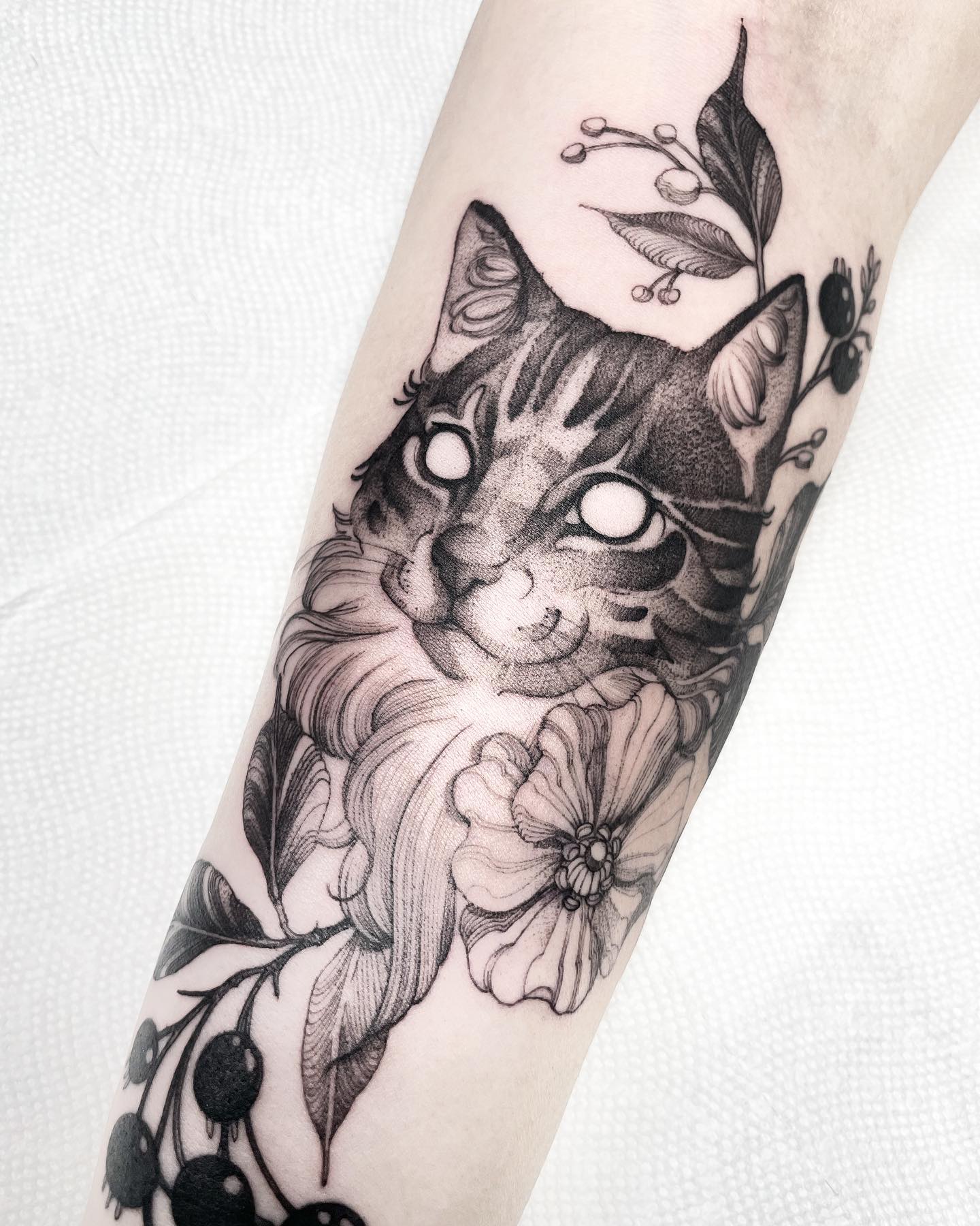 Intricate Cat and Floral Black Ink Tattoo