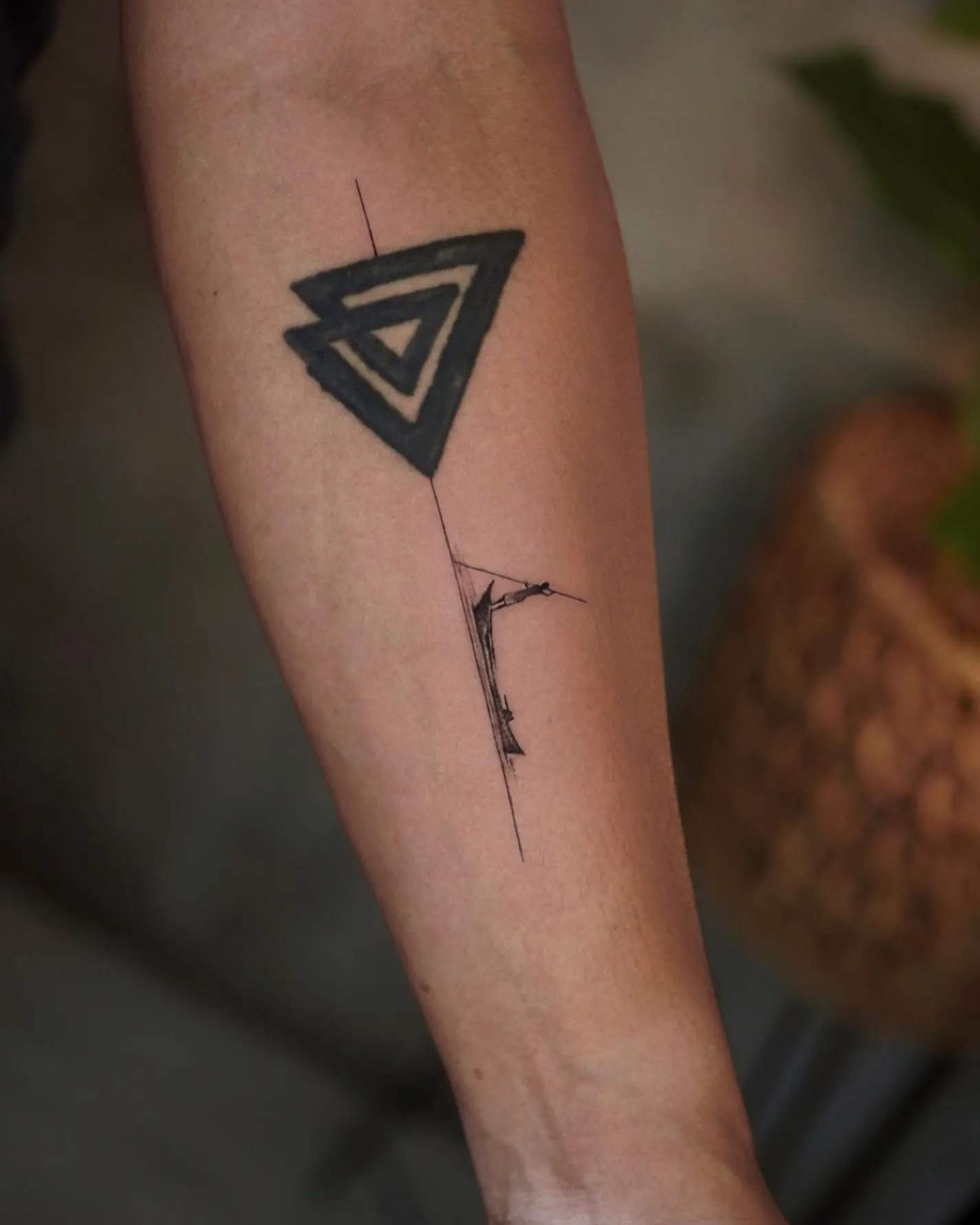 Intricate Double Triangle Tattoo on Forearm