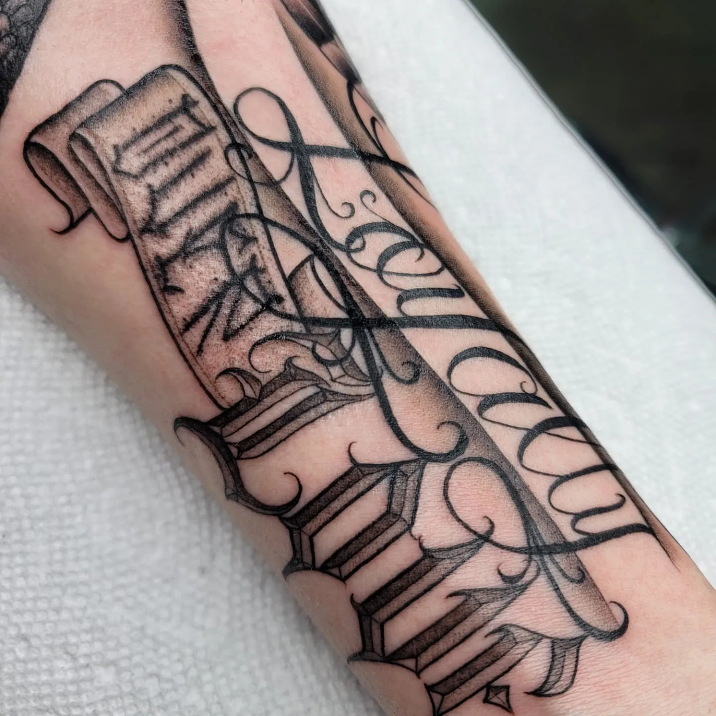Intricate Forearm Tattoo Embodies Loyalty Over Love