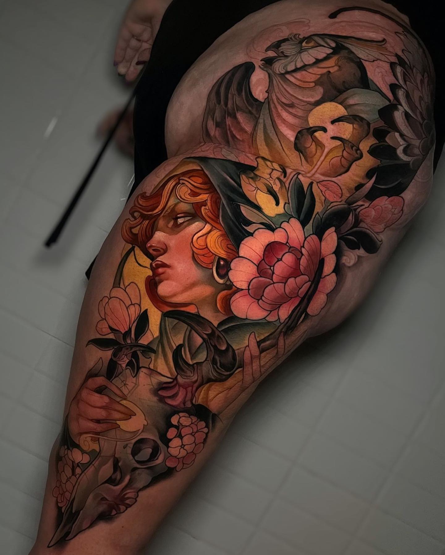 Intricate Full Sleeve Tattoo with Vintage Portrait and Floral Elements