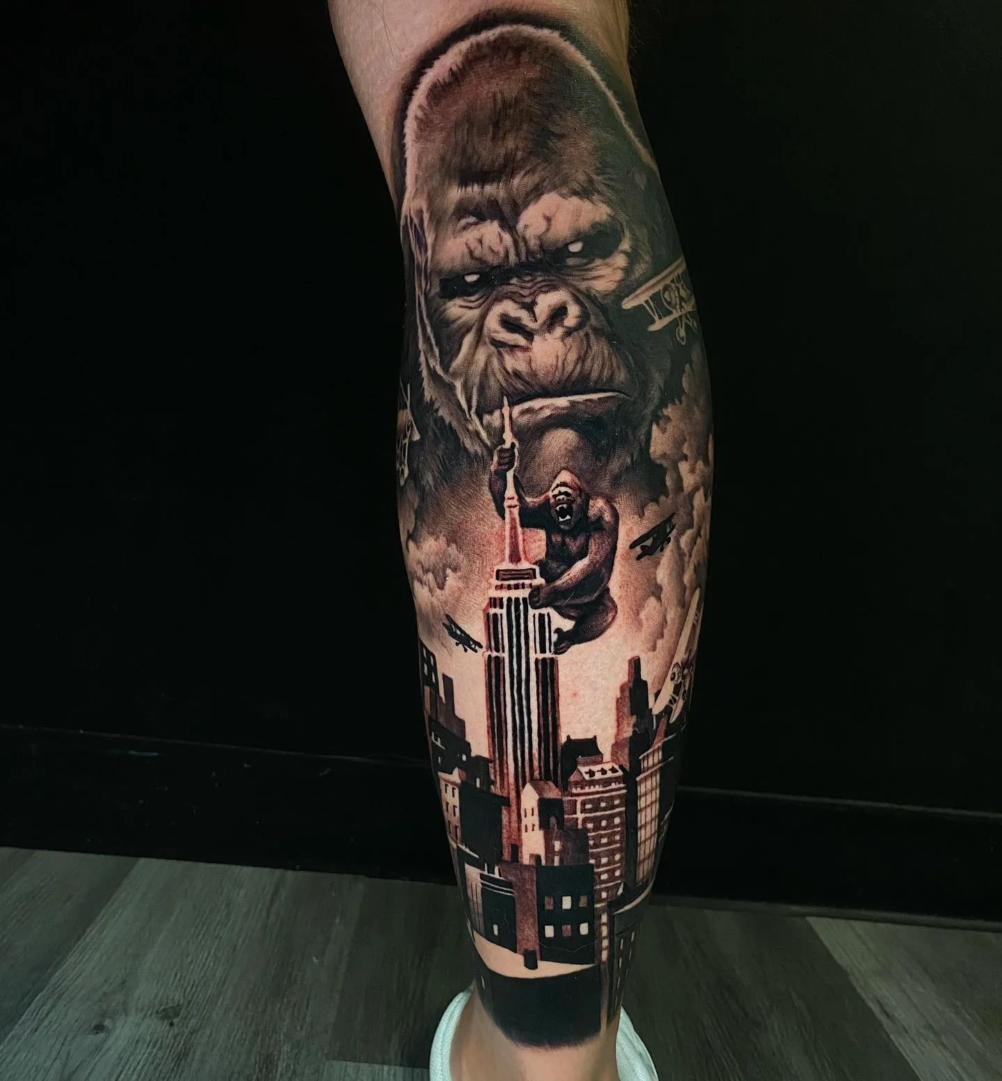 Kong's Intense Gaze Leg Tattoo Artwork