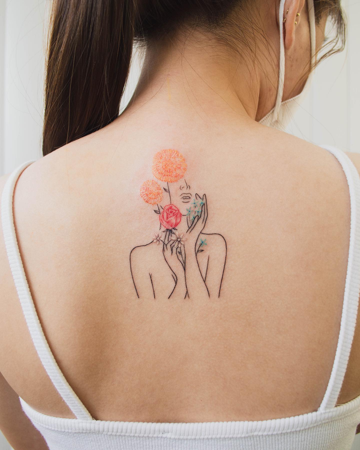 Minimalist Floral Woman Back Tattoo