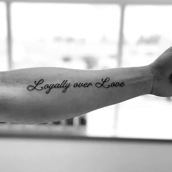 Minimalist Scripted Message on Forearm