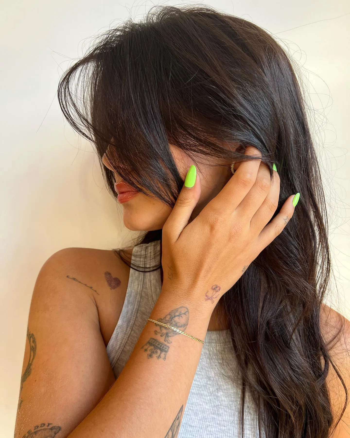 Minimalist flower tattoo on hand side for women