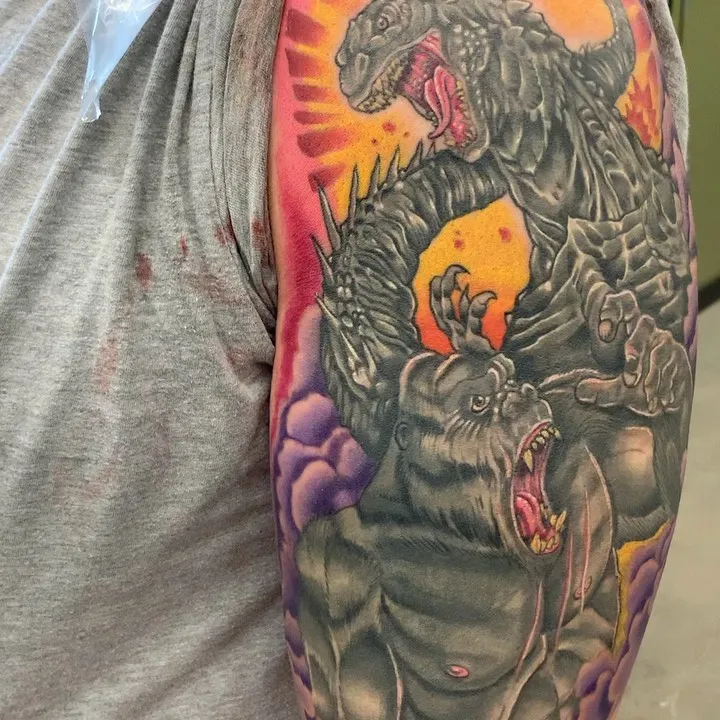 Monochromatic Godzilla and Kong Sleeve Tattoo