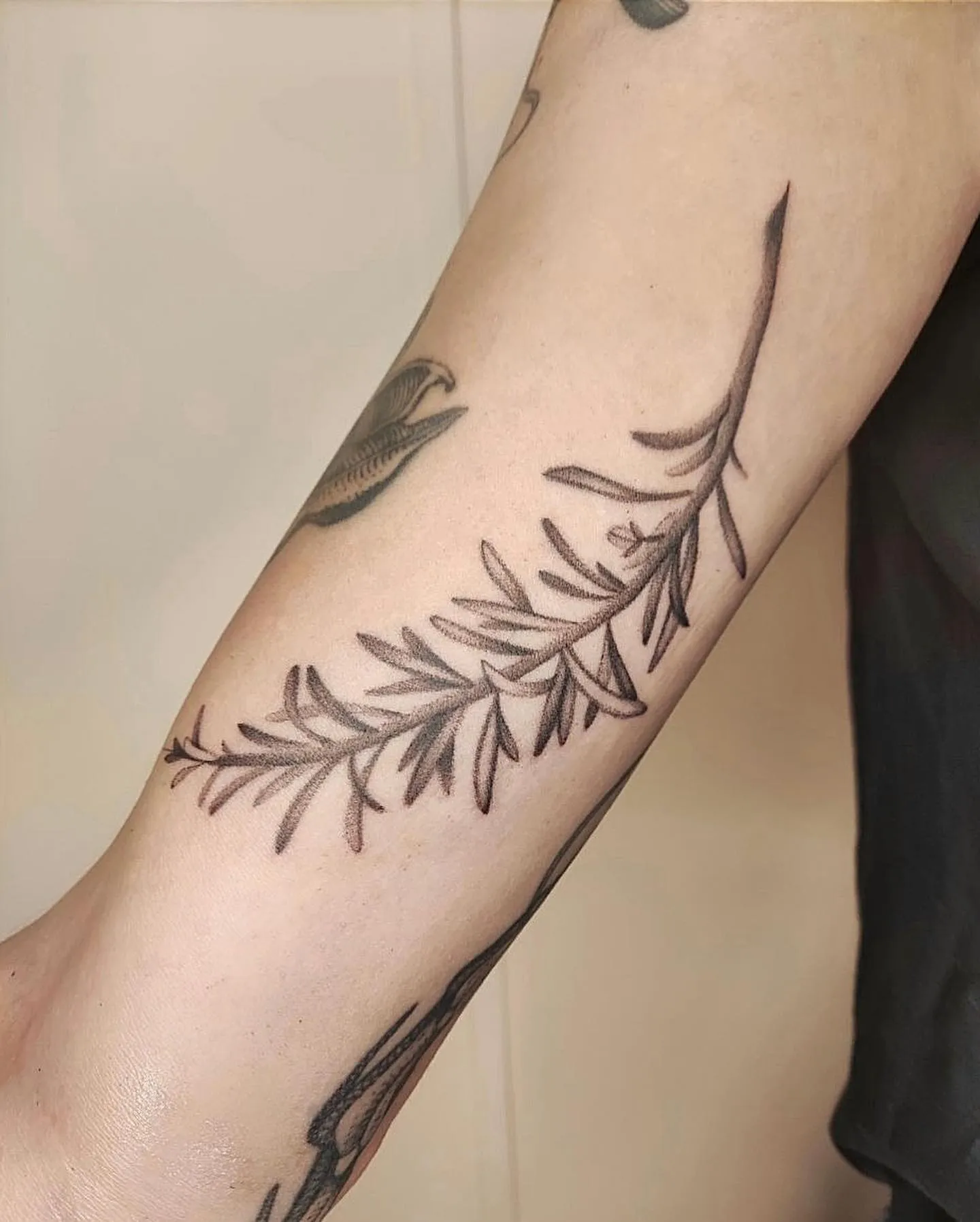 Rosemary and Flowers Arrangement on Bicep