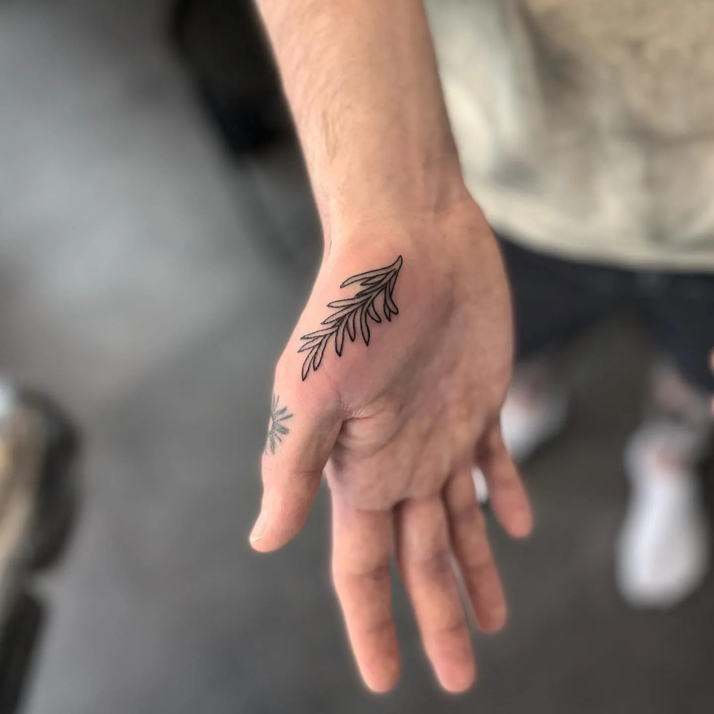 Small Rosemary Twig Tattoo on Hand