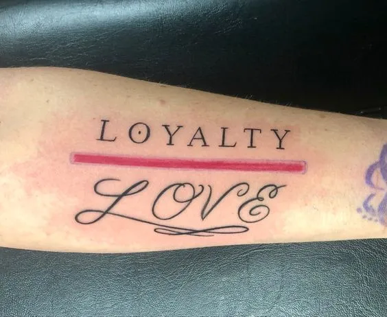 Subtle Loyalty Over Love Tattoo with Underline Accent