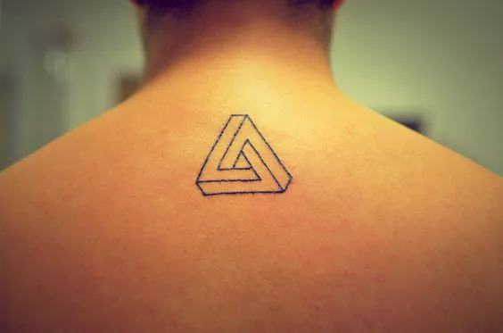 Subtle Single Triangle Tattoo on Upper Back