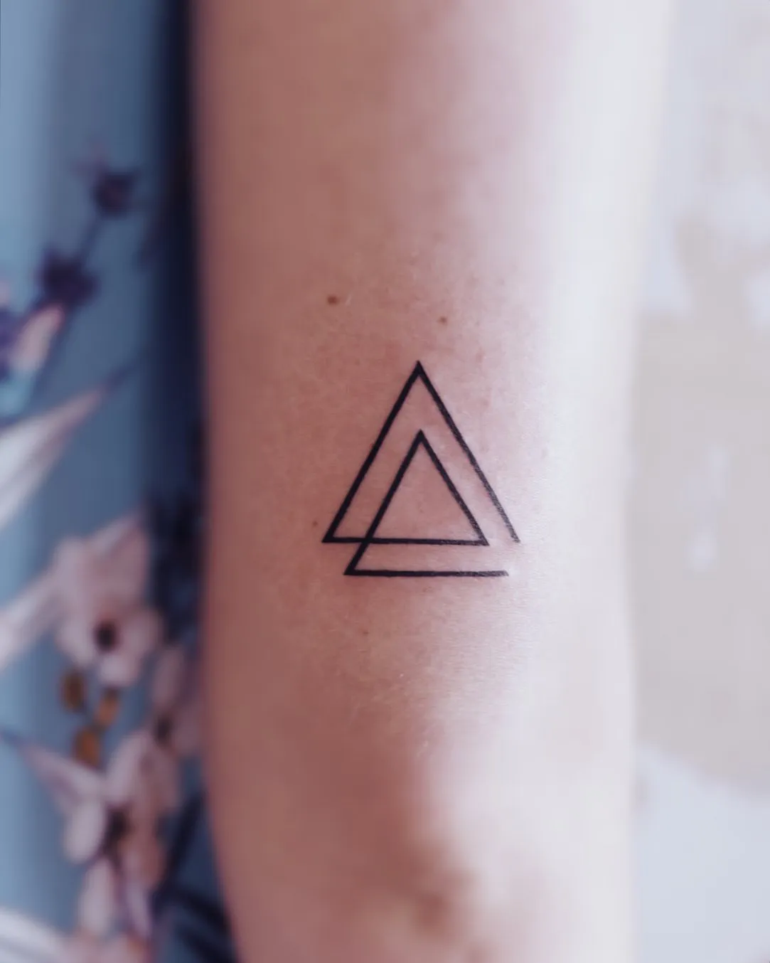 Symmetric Beauty in a Linear Triangle Tattoo