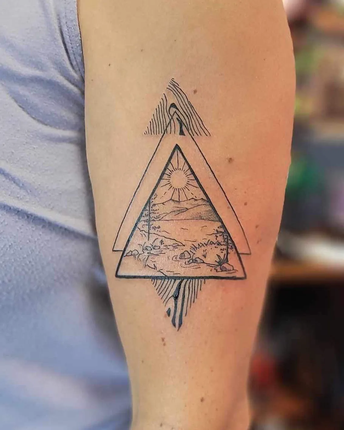 Triangular Landscape Tattoo on Arm