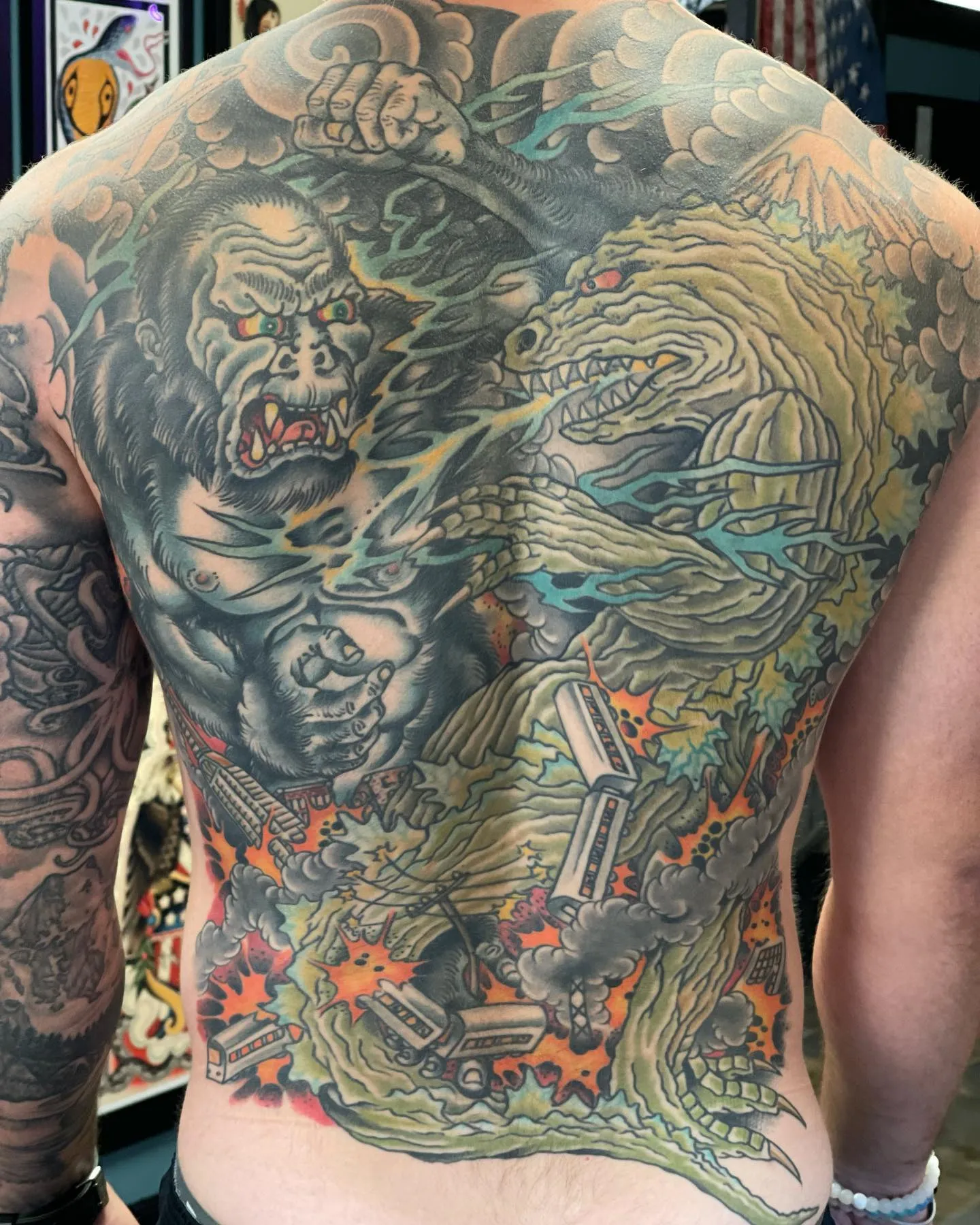 Vivid Godzilla and Kong Clash Tattoo