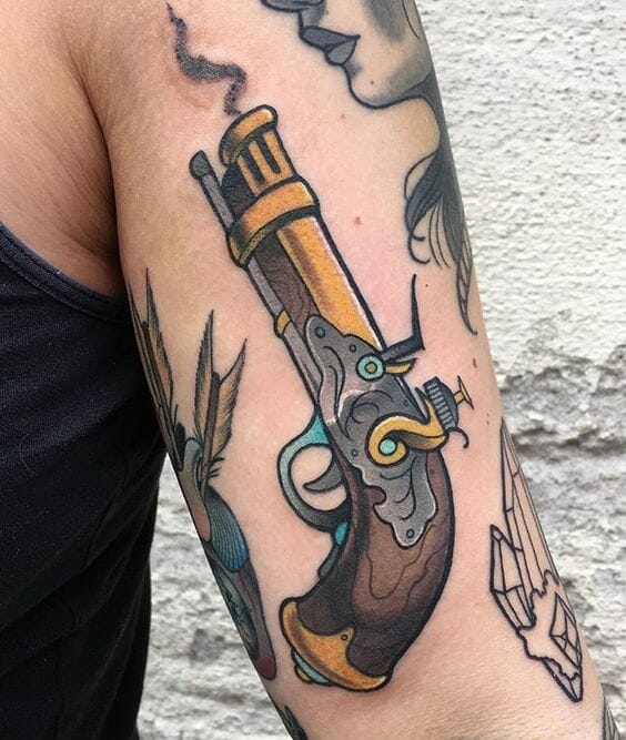 Traditional Gun Arm Tattoo