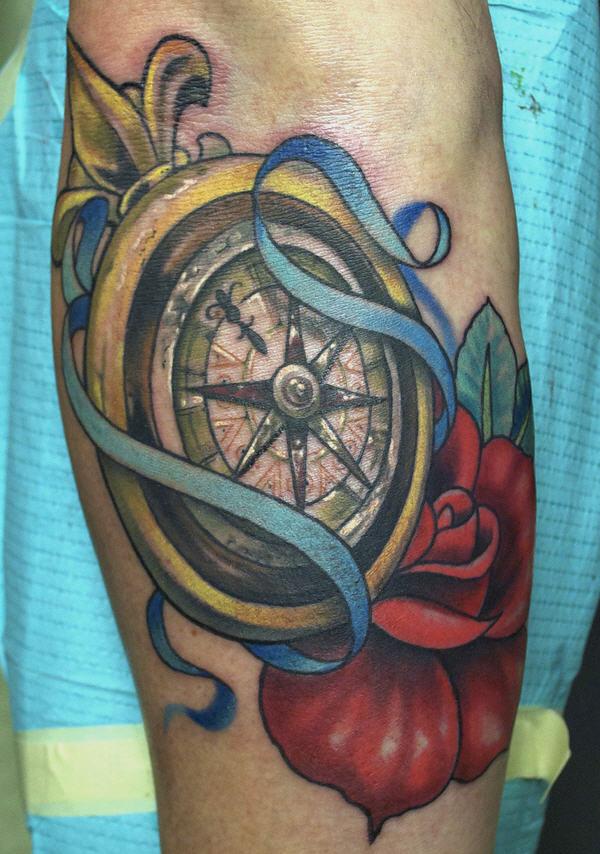 traditional compass arm tattoo