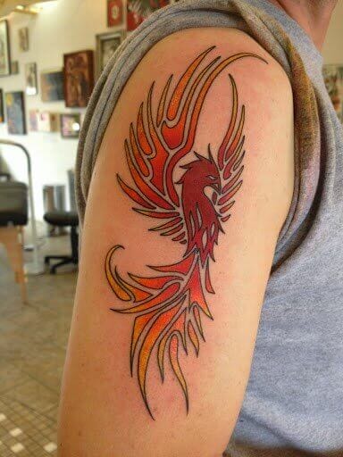 Red Tribal Phoenix Arm Tattoo