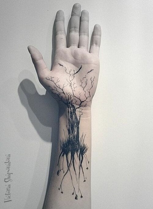 Tree Roots Hand Tattoo