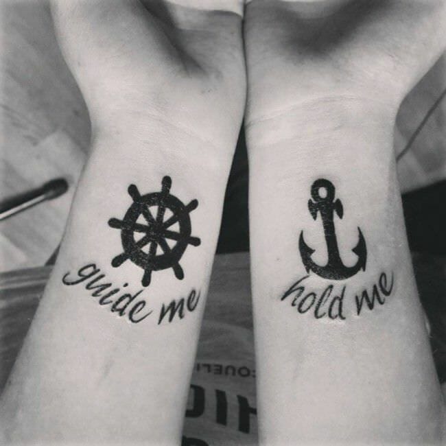 wheel & anchor arm tattoos