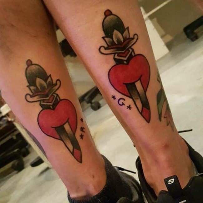 Heart and Dagger's Tattoos on couples ankles