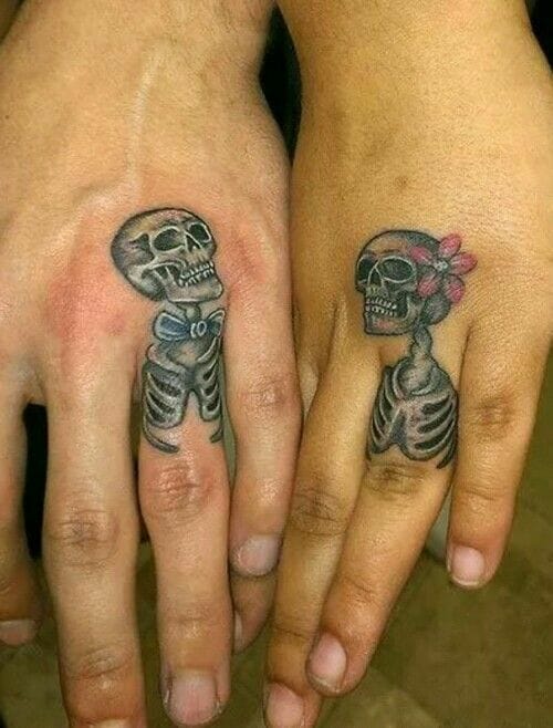 Matching Skeleton Tattoos on couples hands