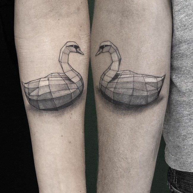 matching swan couples tattoos