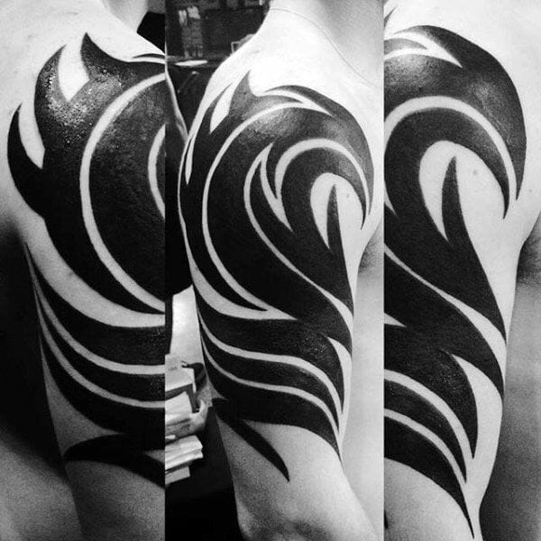 Solid Black Ink Tribal Arm Tattoo