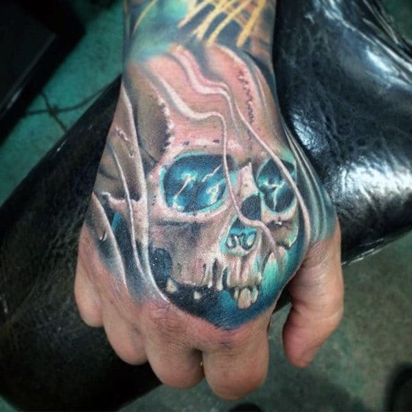 Glowing Hand Skull Tattoo