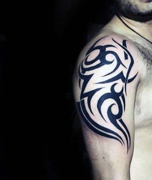 Creative Tribal Upper Arm Tattoo