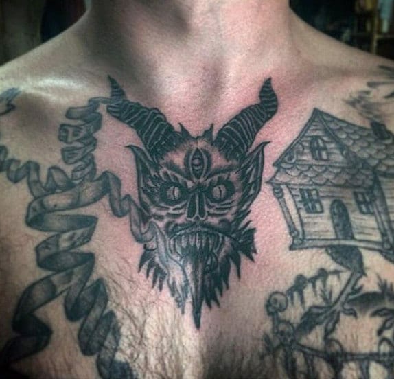 Guy with Devil Tattoo Chest Design
