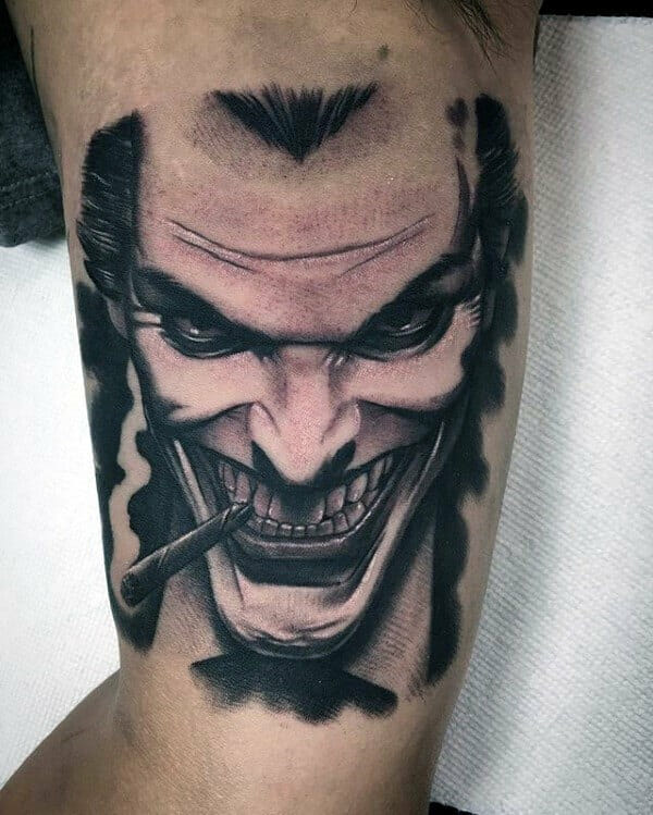 The Joker Bicep Tattoo