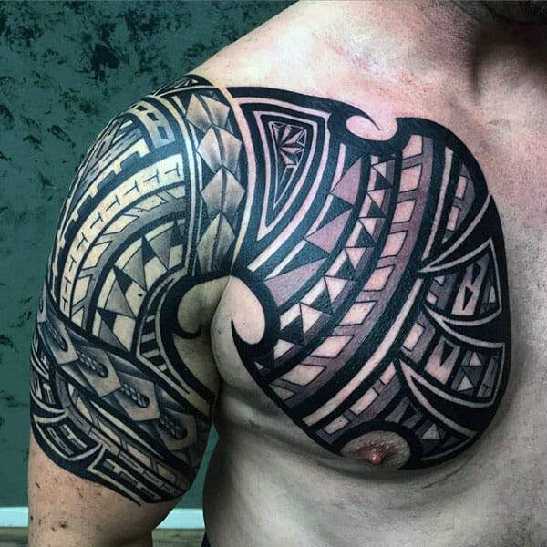 Polynesian Tribal Chest & Arm Tattoo