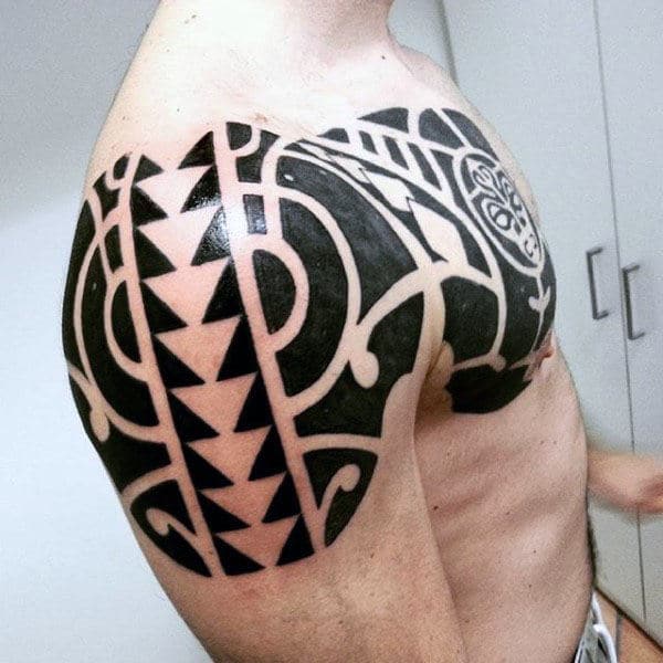 Tribal Arm & Chest Tattoo