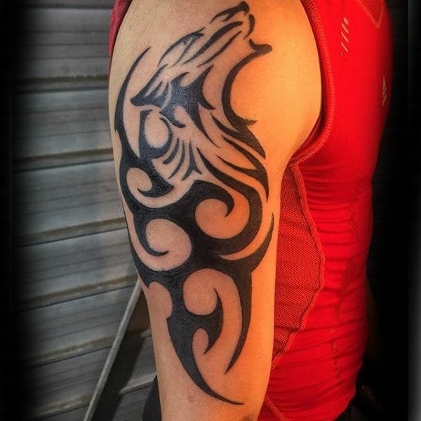 Tribal Wolf Arm Tattoo