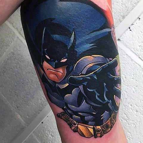 Man with 3D Bicep Batman Tattoo