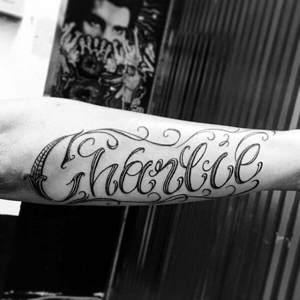 man with charlie name outer forearm tattoo Outsons